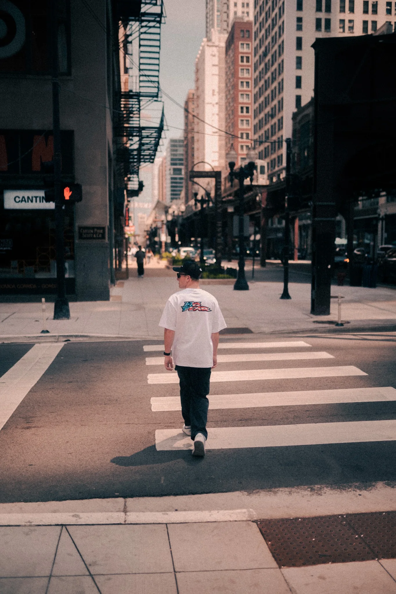 NO FEAR apparel photographed at a downtown crosswalk