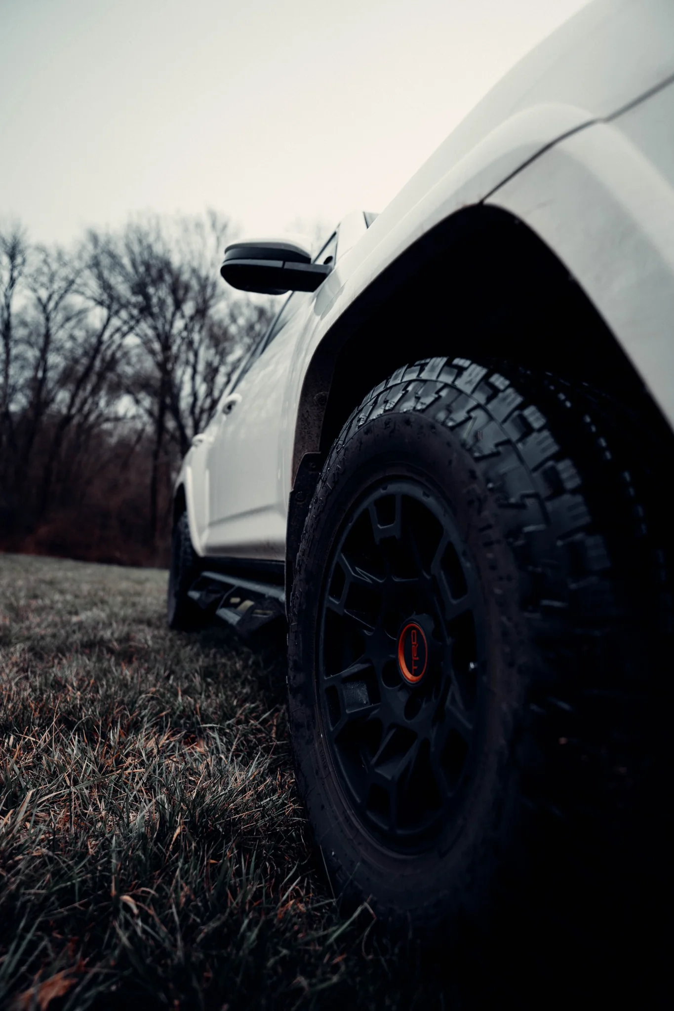 Low-angle automotive detail of a Toyota off-road wheel